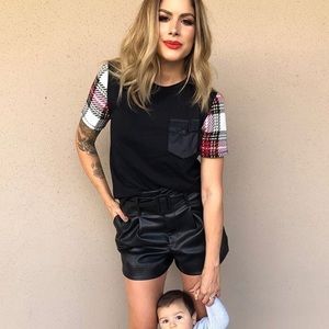 Black top with pocket and detail sleeves